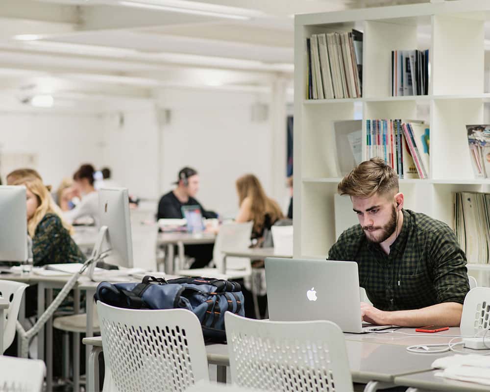 Image of a student in the graphics studio